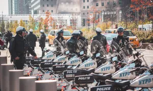 Police gathered near row of police motorcycles